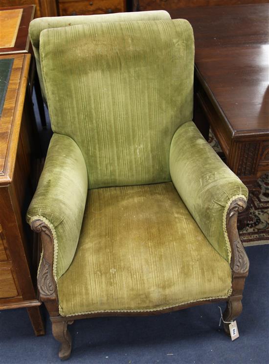 A pair of Victorian walnut armchairs